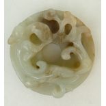 A Chinese Jade dragon pendant: Pendant diameter 6.