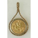 Gold Half Sovereign coin: Edward VII 1910 half sovereign coin, in 9ct gold clip mount,