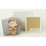 Michael Kors quartz multi dial wristwatch: Watch with stone set bezel, unused, boxed with paperwork.