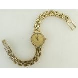 9ct gold ladies Tissot Wristwatch: Wristwatch with 9ct bracelet, gross weight 19.8 grams.