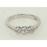 18ct white gold three stone diamond ring: Ring size L, 3.7grams.