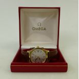 Omega Geneve gold plated gents date Mechanical Wristwatch: Watch with leather strap and Omega