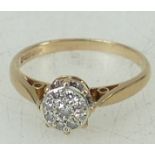 9ct gold ring: Ring set with centre cluster of diamonds, size K/L, 2 grams.