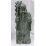 Chinese large green Soapstone figure of a Bearded Immortal: Figure holding a staff,