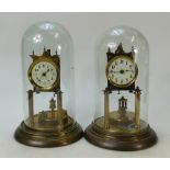 Early 20th century brass Perpetual clock under a glass dome plus another: Clock height 31cm and a