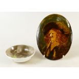 Royal Doulton oval wall plaque of a cavalier and a dish: A Cavalier wall plaque by Charles Noke,