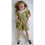 Schoenau & Hoffmeister very large porcelain headed doll: Doll marked to reverse of head SH either