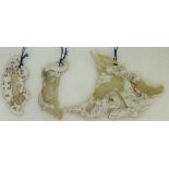 A group of Archaistic Jade plaques: Group comprising a partially calcified jade Chilong plaque,