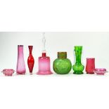 A collection of glassware: Glassware to include Cranberry glass bell, vases, dishes,