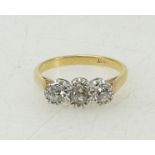 18ct 3 stone diamond ring 0.6ct: Diamond 3 stone dress ring, each old cut stone measuring about .