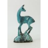 Beswick blue glazed Fawn: Beswick model of a fawn on rock 696 height 20cm.