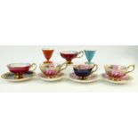 A collection of Aynsley tea cups and saucers: Aynsley cups and saucers decorated inside & out with