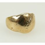 Gents yellow coloured metal ring marked 14ct: Ring tested as gold. Size T.