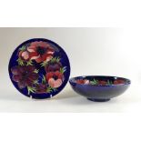Moocroft large fruit bowl and plate: Items decorated in the Anemone design, both diameter 26cm.