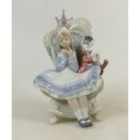 Lladro large figure titled 'Alice in Wonderland': A large Lladro privilege gold figure dated 2009,