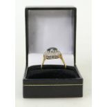 18ct gold Sapphire Diamond ring: Ring set with centre sapphire and 14 diamonds, size P/Q, 5.