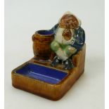 Doulton Lambeth Stoneware Match Striker of a seated man: Match Striker by Doulton Lamberth of a