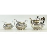 Silver 3 piece Tea Set: A hallmarked half fluted harlequin set of 3 near matching pieces.