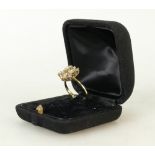 18ct gold Diamond cluster ring: Ring set with 13 various size diamonds, size Q, 3.7 grams.