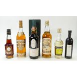 A collection of vintage whisky & spirits: Items including Lagavulin single malt,