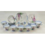 A collection of Shelley china tea ware: Shelley tea ware decorated in the Hollyhocks design 12019