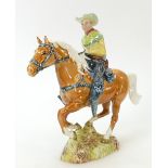 Beswick model of a Cowboy: Beswick Cowboy on galloping Palomino horse 1377.