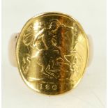 Half Sovereign gold ring: Coin dated 1909 & showing considerable wear,