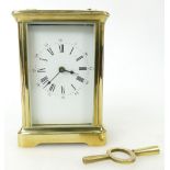 Brass carriage clock: Timepiece winds ticks and runs for a short period, so needs a service.