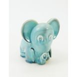 Beswick blue glazed comical Elephant: A Beswick model of a comical elephant 569 height 12.5cm.