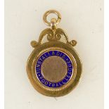 9ct gold medal: Medal enamelled 'Tunstall & District Football League', 7.4 grams.