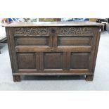 Oak Coffer: 18th century Oak Coffer with carved decoration, measuring 114cm x 50cm x 79cm high.