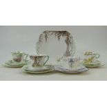 A collection of Shelley china: Shelley china cup & saucer trios in various shapes and designs and a