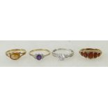 4 x 9ct gold gem set rings: Solitaire white stone size O, garnet 5 stone O,