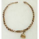 Rose gold coloured metal watch chain: Watch chain marked 9ct, and tested as gold,
