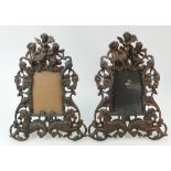 Pair of vintage ornate Cast Iron Photo Frames: Frames decorated with cupids and horses in copper