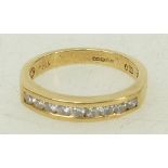 18ct gold half Eternity ring: Ring set with .33ct diamonds, size L/M, 3.2grams.