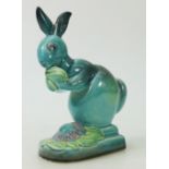 Beswick blue glazed Rabbit: Beswick model of a stylized rabbit munching 316.