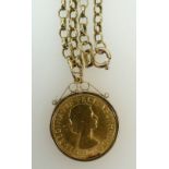1968 Full Sovereign coin with 9ct mount & chain: Coin mount and chain 23.7g gross weight.