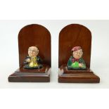 Pair of Royal Doulton Dickens bookends: The dickens busts are mounted on wood stands (2)