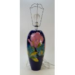 Moorcroft Lamp Base: Lamp base decorated in the Magnolia design, height 37cm.