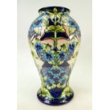 Moorcroft vase in Profusion design: Profusion vase, silver line seconds, height 44cm.