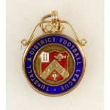 9ct gold medal: Medal enamelled 'Tunstall & District Football League', 5.5 grams.