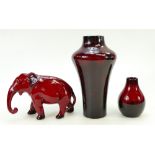A collection of Royal Doulton Flambé items: Flambé items including - elephant with trunk down