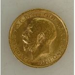 Full gold Sovereign coin: Full sovereign dated George V 1912.