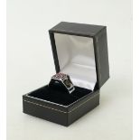 9ct White gold modern gem set ring: Unisex ring design set with 25 small light red gemstones.