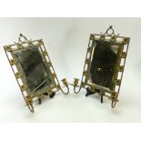 Pair of Edwardian brass decorative Wall Mirrors: Mirrors with ornate flower decoration with
