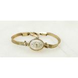 14ct gold ladies Longines wristwatch: Wristwatch with 14ct gold bracelet, overall weight 13.2 grams.