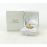 18ct gold Diamond ring: Ring set with centre beige precious stone and diamonds, size O, 5.7 grams.