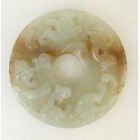 A Chinese Jade three dragon pendant: Pendant diameter 7 cm,