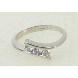 18ct white gold three stone Diamond ring: Diamond weight approx .15ct size L, 3 grams.